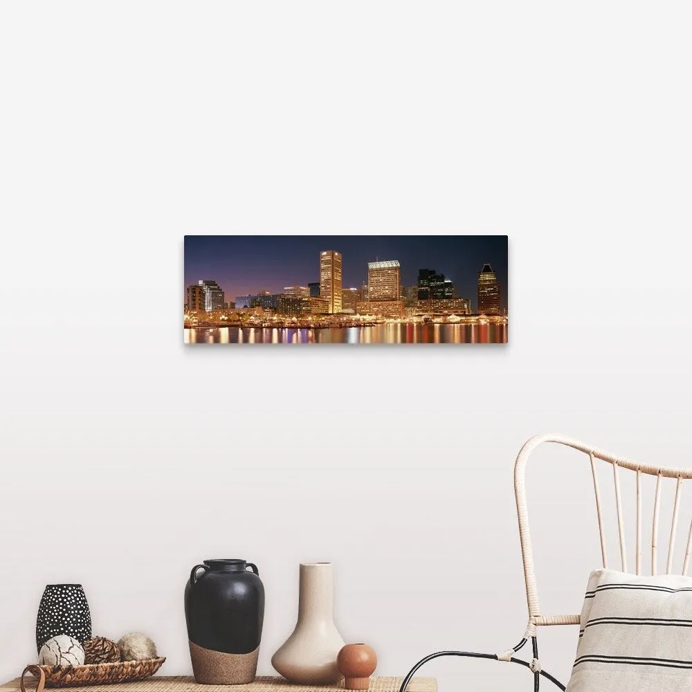 "Buildings lit up at dusk, Baltimore, Maryland" Canvas Wall Art