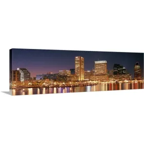 "Buildings lit up at dusk, Baltimore, Maryland" Canvas Wall Art