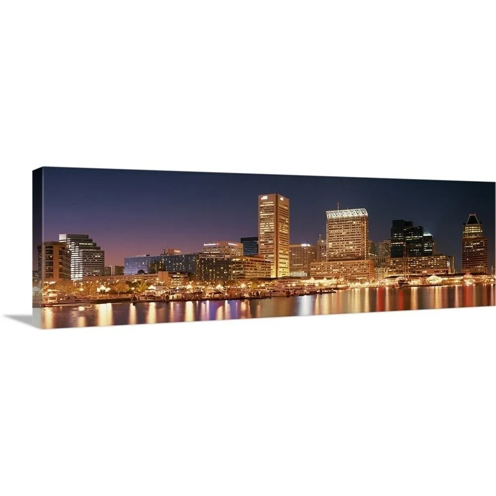 "Buildings lit up at dusk, Baltimore, Maryland" Canvas Wall Art